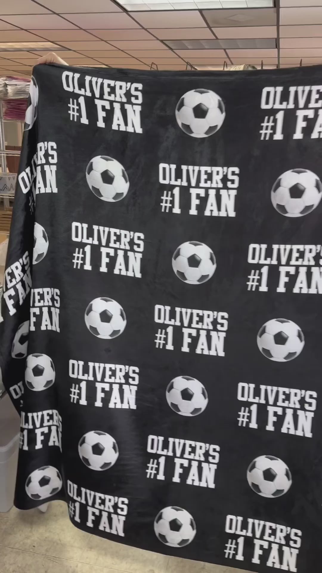 Behind the scenes video of making a bleacher blanket for a soccer fan.